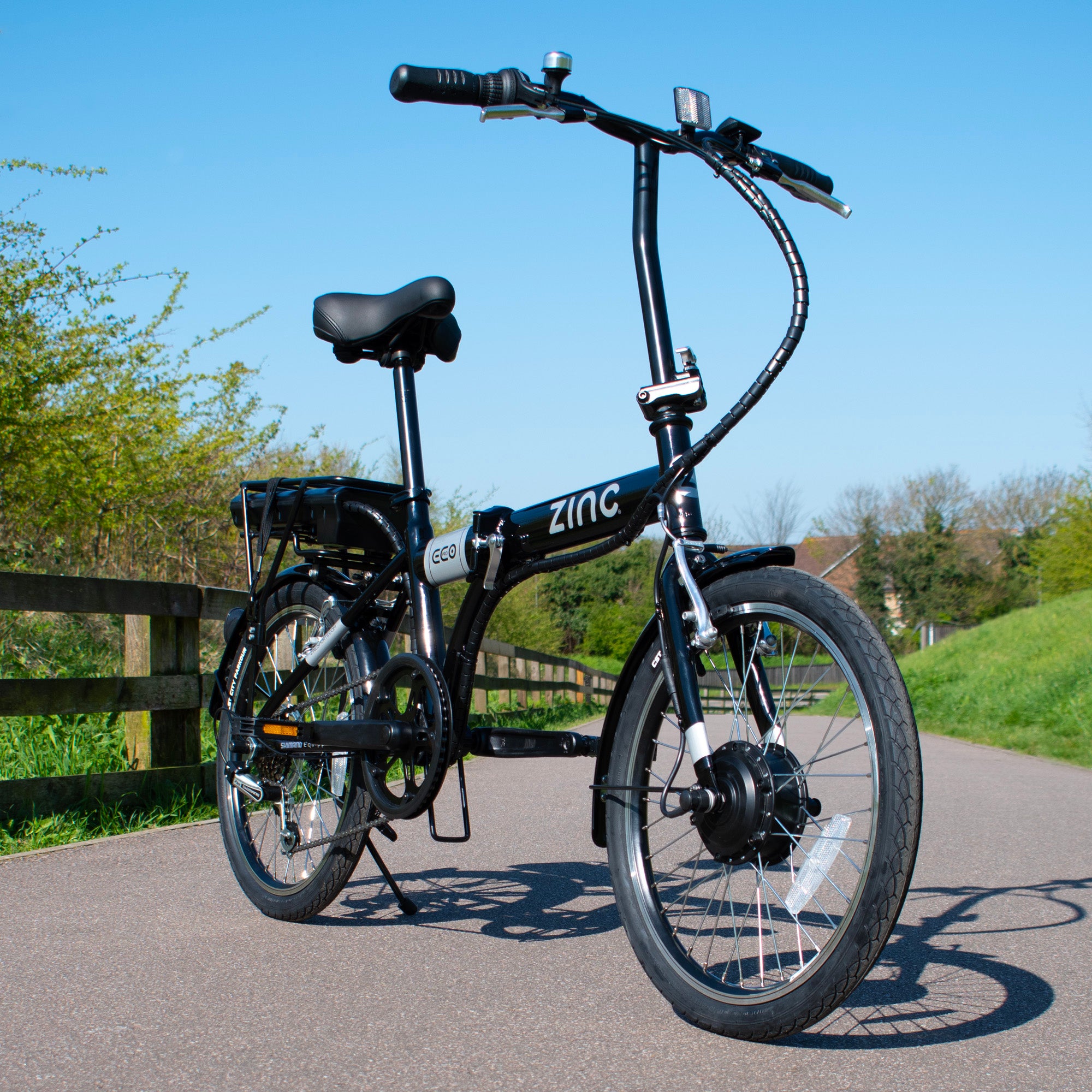 Zinc Folding Electric Eco Pro Bike with 250W motor, 6-speed Shimano gears, and 34.2-mile range