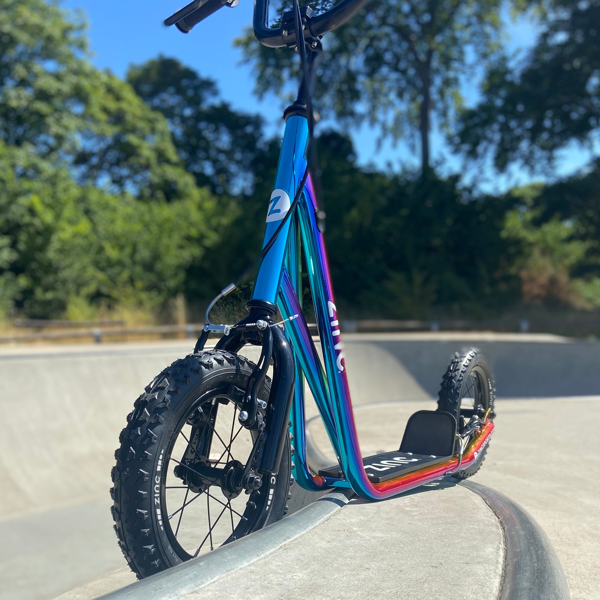 Zinc 12 Inch BMX Scooter Neochrome Multi-colour at Skate Park - Action Sports Ready