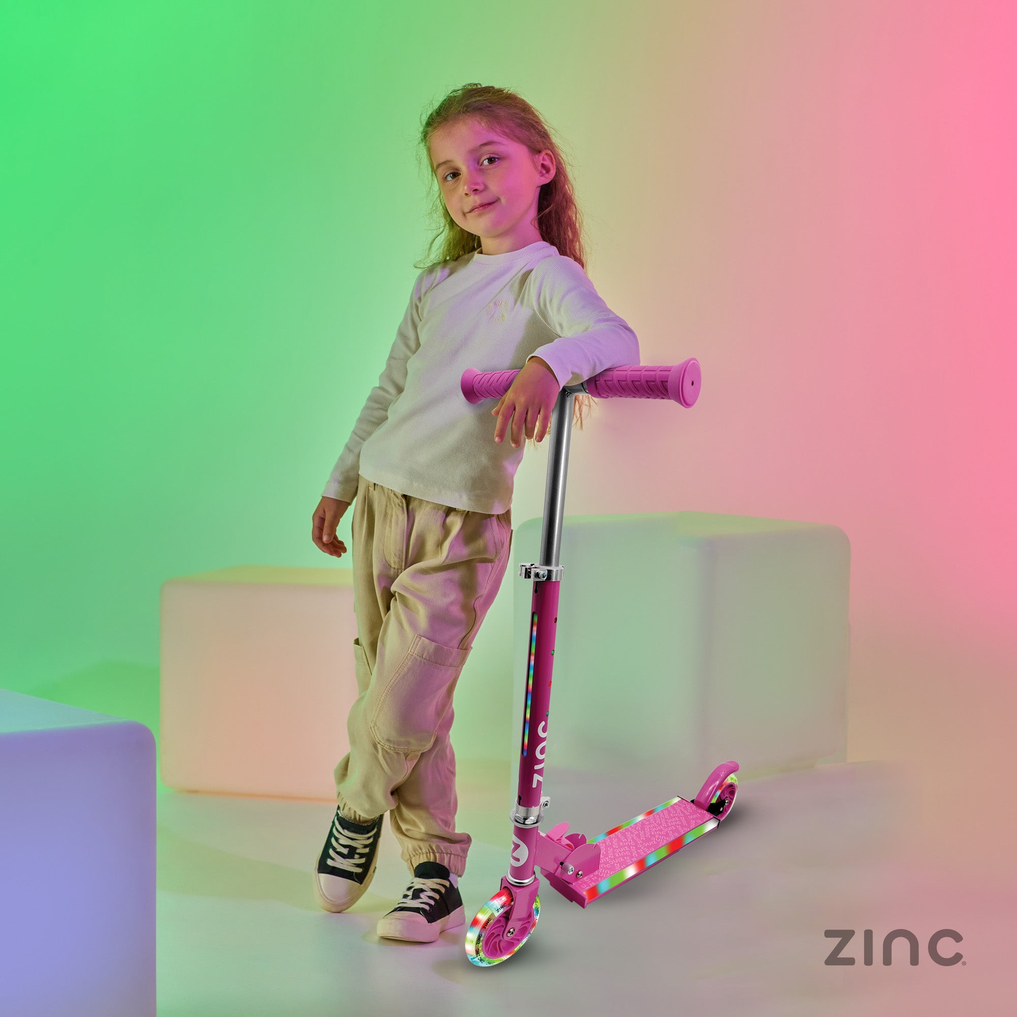Young girl with a pink scooter against a colorful gradient background