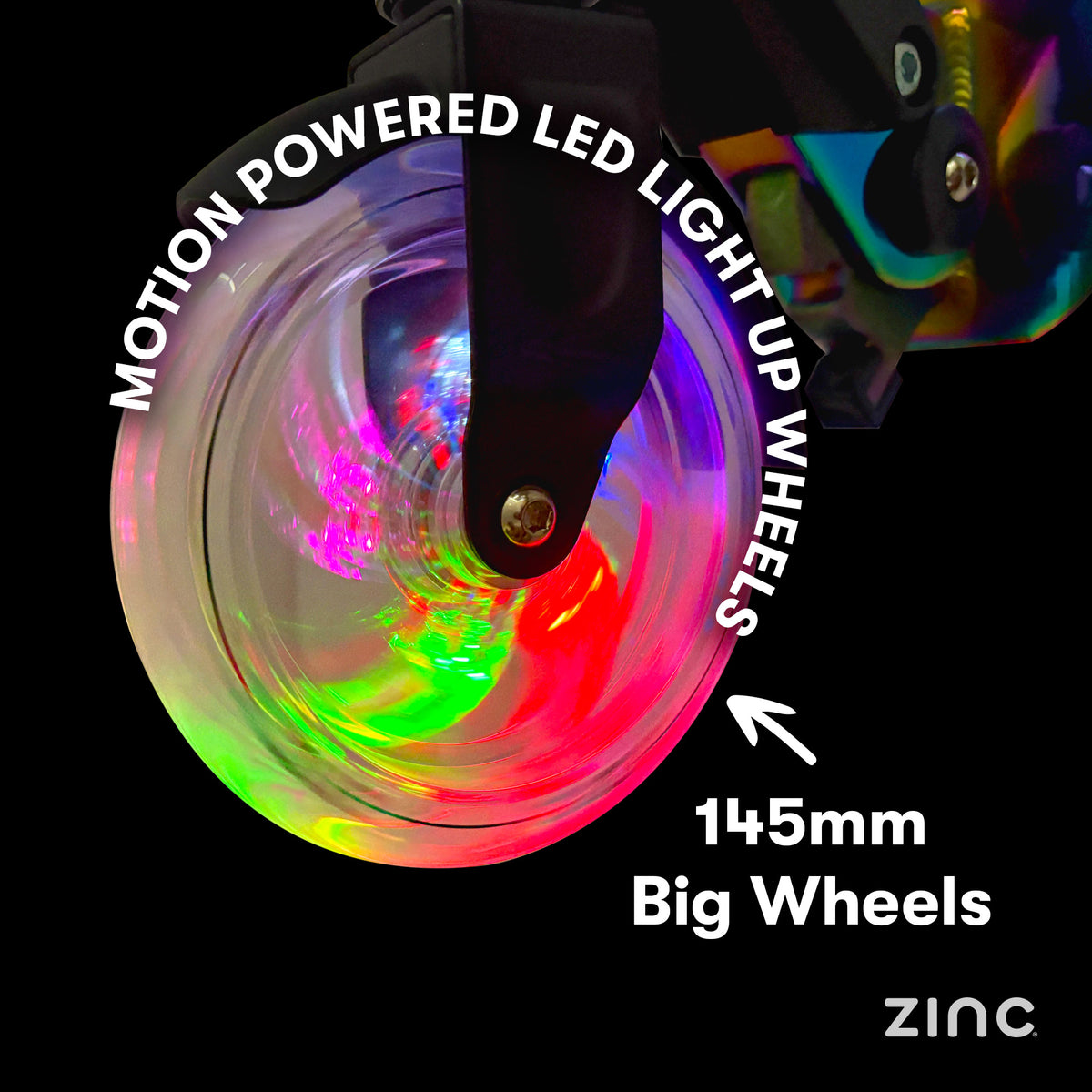 A close-up of a large illuminated wheel on a black background with text reading 'MOTION POWERED LED LIGHT UP WHEELS' and '145mm Big Wheels.' The wheel shows bright multicolor LED light effects including pink, red, green, and blue.