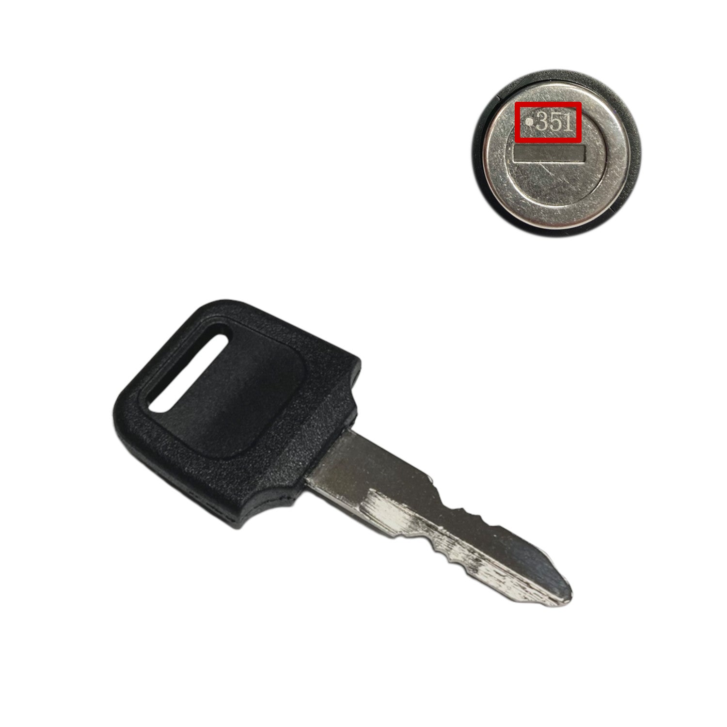 Car key blade and key fob on a white background