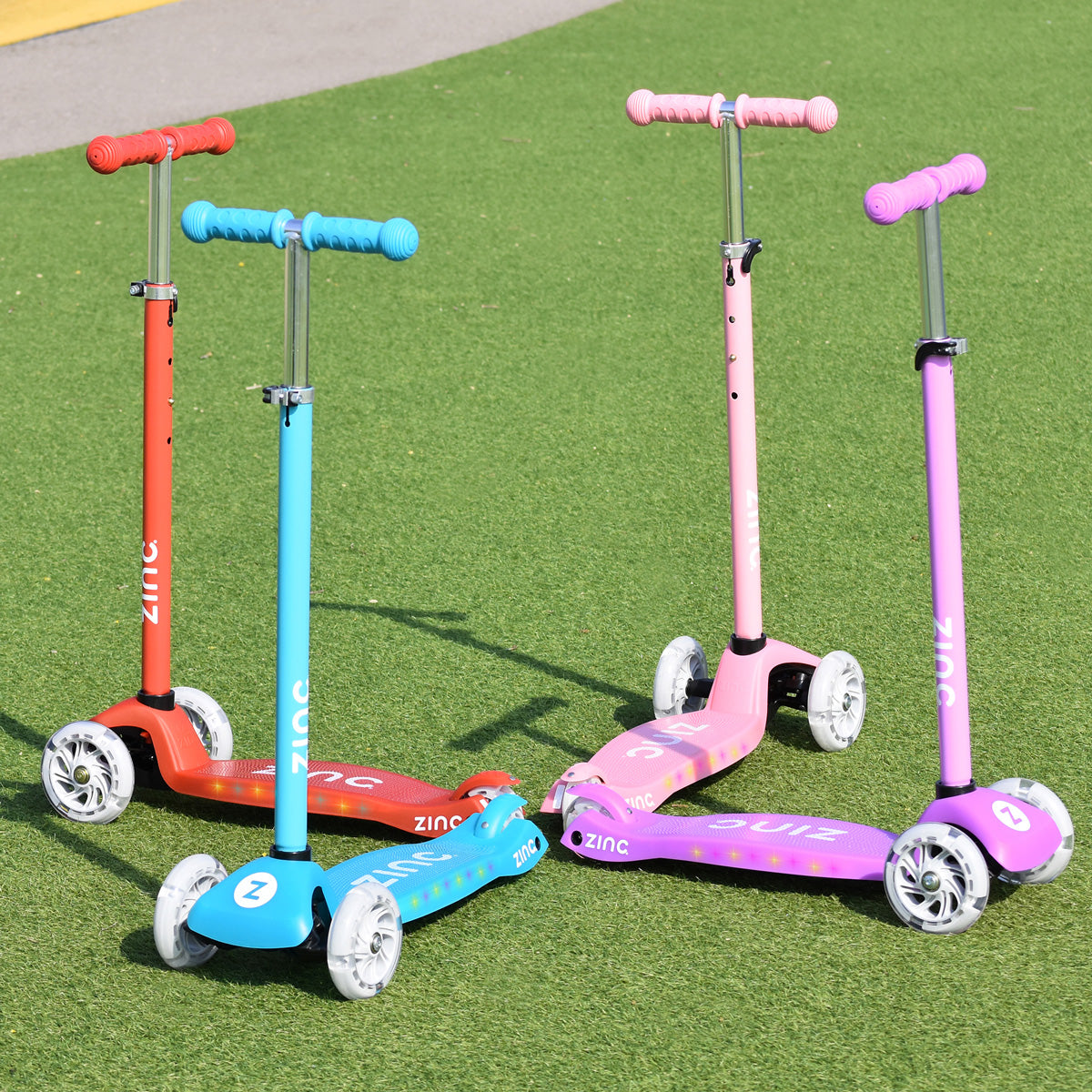 Red, blue, purple and pink Zinc Superstar non-folding scooter.