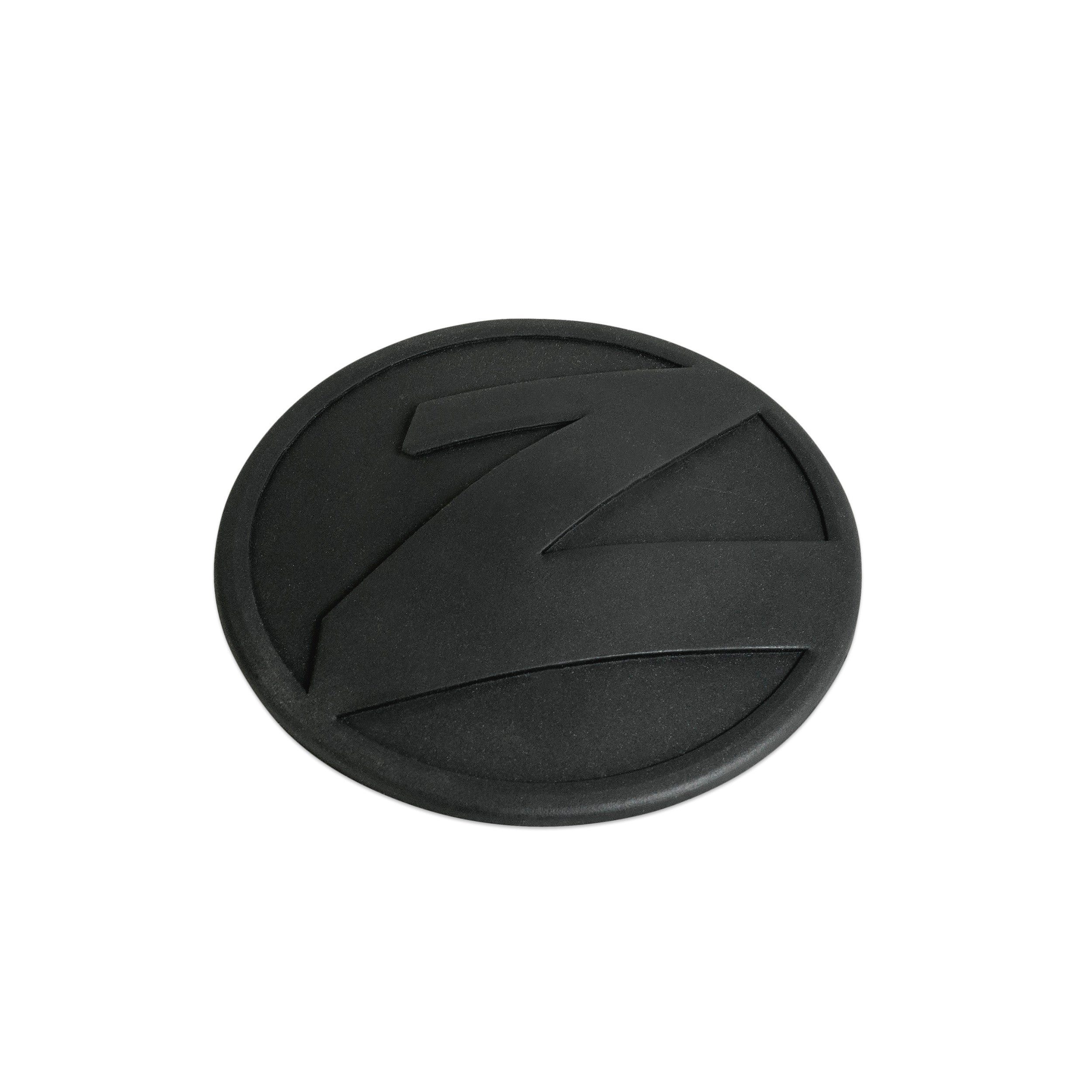 Black sensor pressure pad with the ZINC logo embossed on it, likely made of rubber or a rubber-like material.