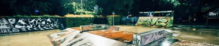Empty skate park at night.