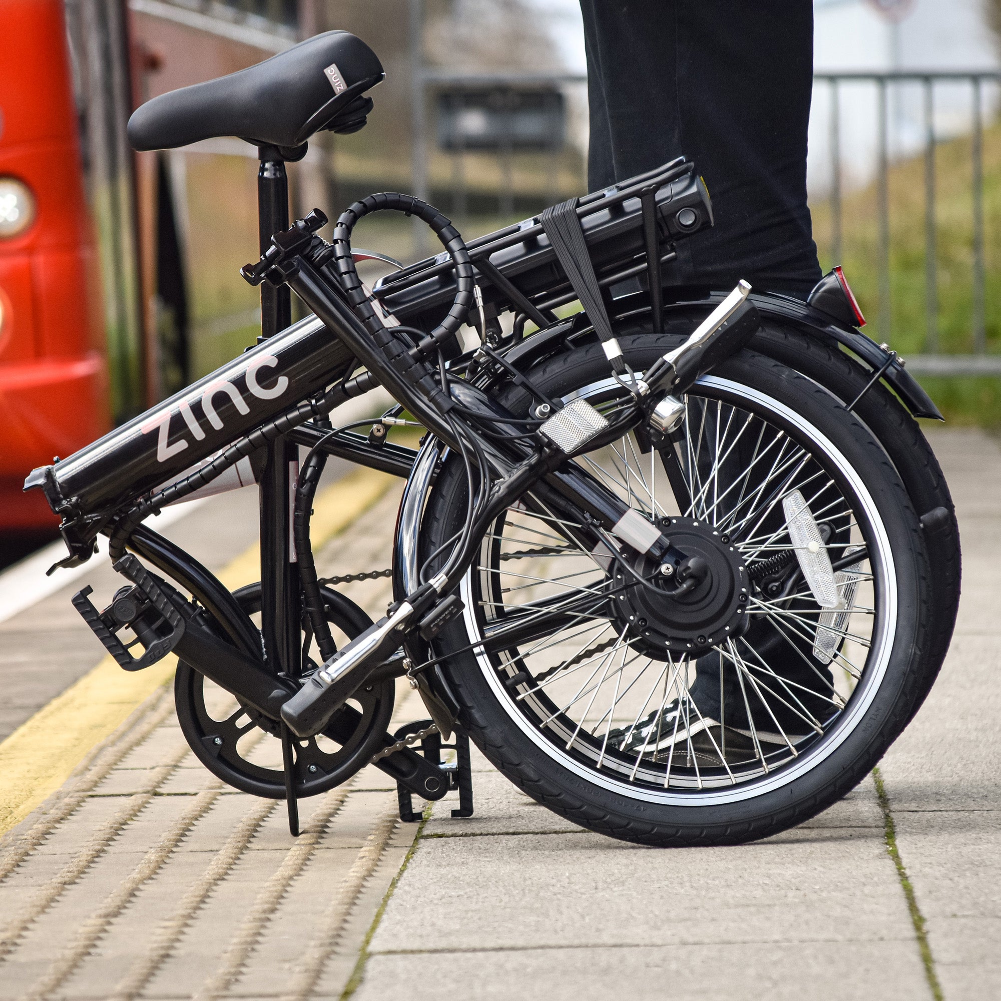 Space-saving folded electric bike perfect for car boot storage and apartment living with kickstand