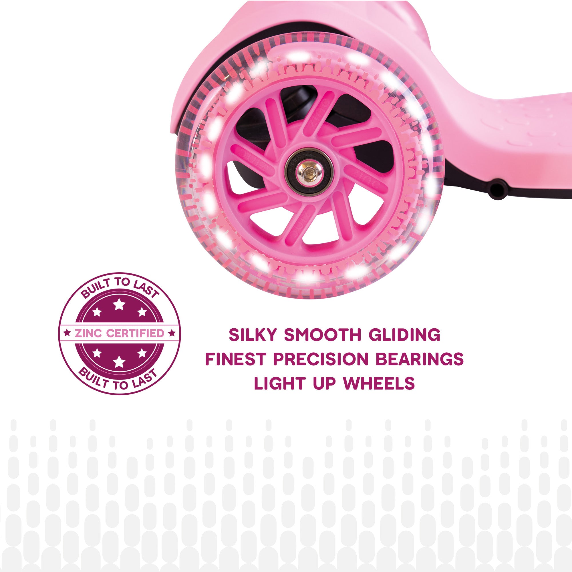 Close-up of pink Zinc Flyte scooter wheel and bearing system