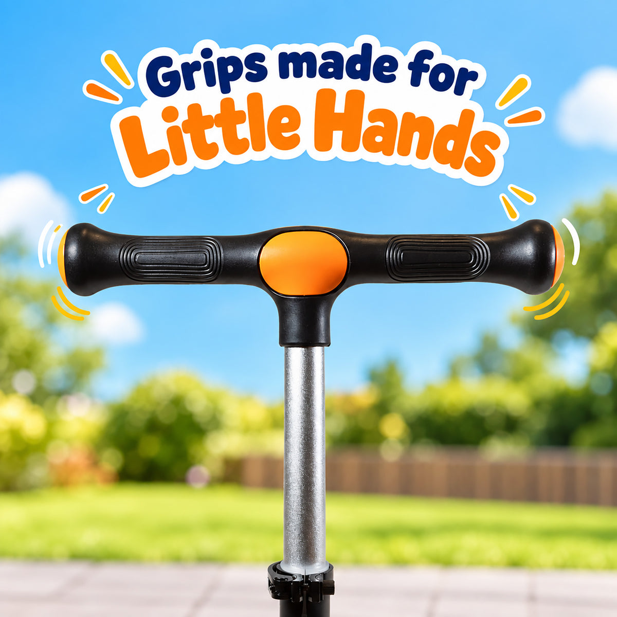 A close-up of a T-shaped scooter grip handle with black textured grips and an orange center pad, mounted on a silver stem. The background is a blurred outdoor scene with green grass, trees, and a blue sky.