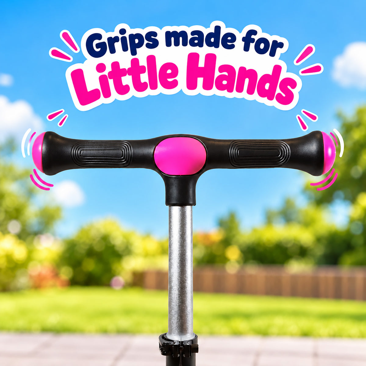 A close-up of a T-bar handlebar with black textured grips and bright pink center and end accents, mounted on a silver pole. Large overlaid text reads 'Grips made for Little Hands' against a blurred outdoor background with blue sky and green grass.