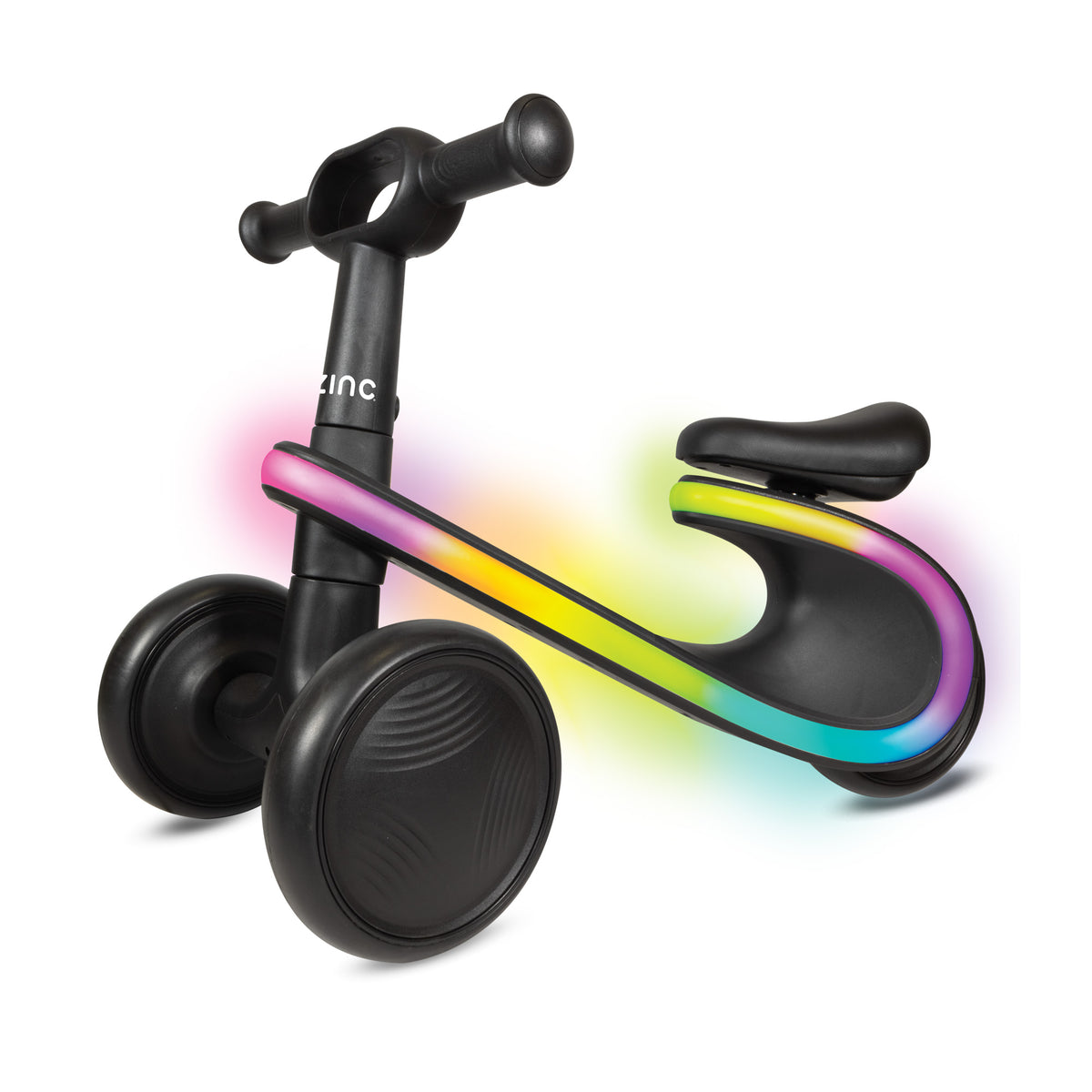 Black balance bike with a glowing rainbow LED light strip on the frame, shown on a white background with a soft pink, yellow, green, and blue glow effect.