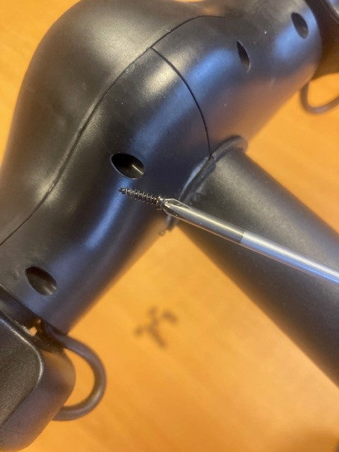 ZINC Eco scooter communication cable installation step 1 - locating connection port on electric scooter