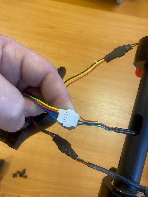 ZINC Eco electric scooter cable connection step 2 - preparing communication cable for installation