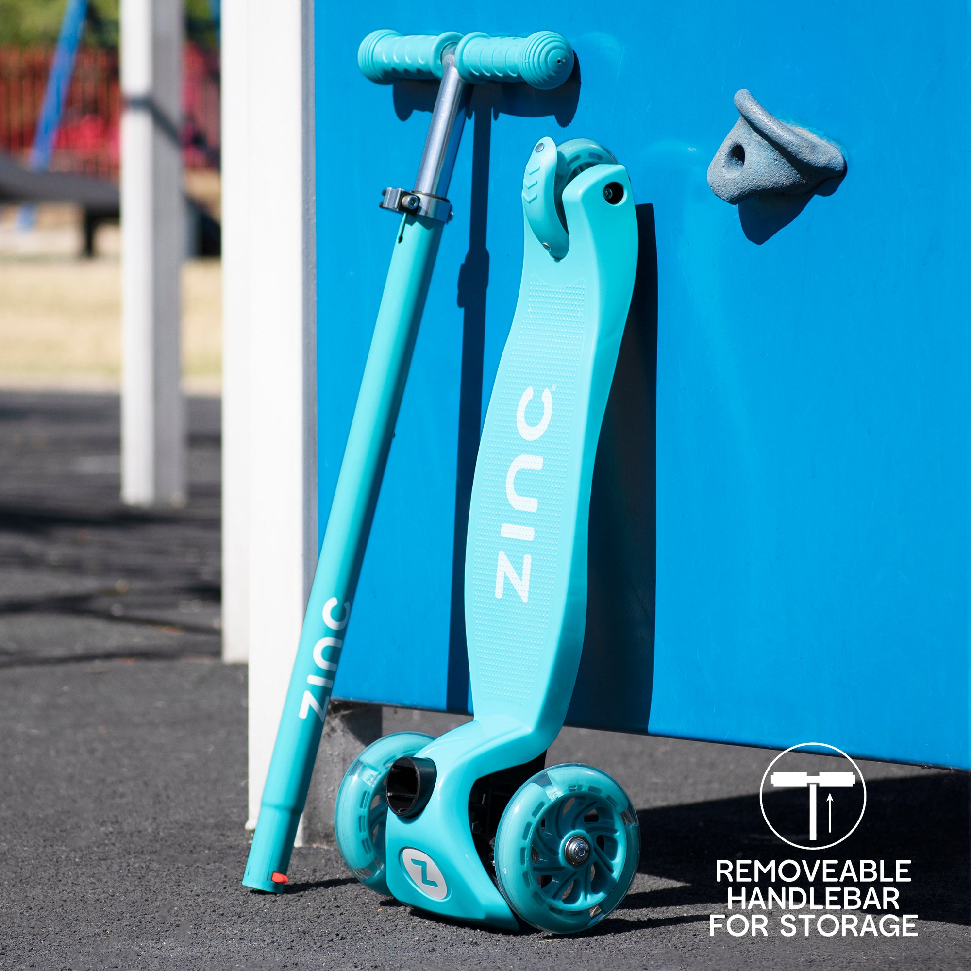 Zinc Three Wheeled Light Up Star Scooter in blue disassembled showing base deck with three wheels separated from handlebar assembly