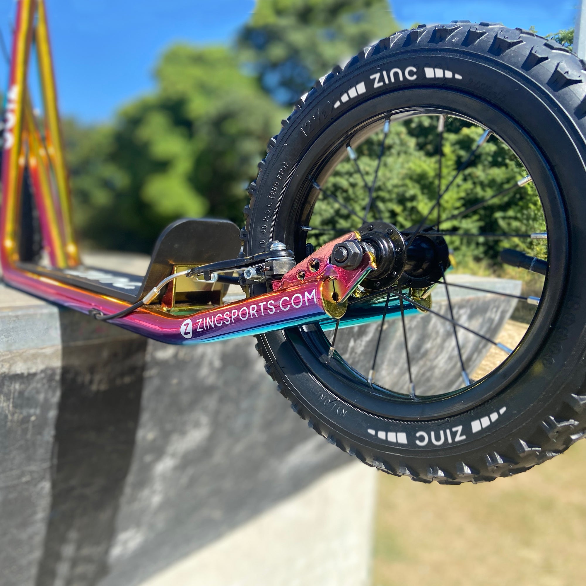 Zinc 12 Inch BMX Scooter Neochrome Multi-colour - Back Wheel Close-up Detail