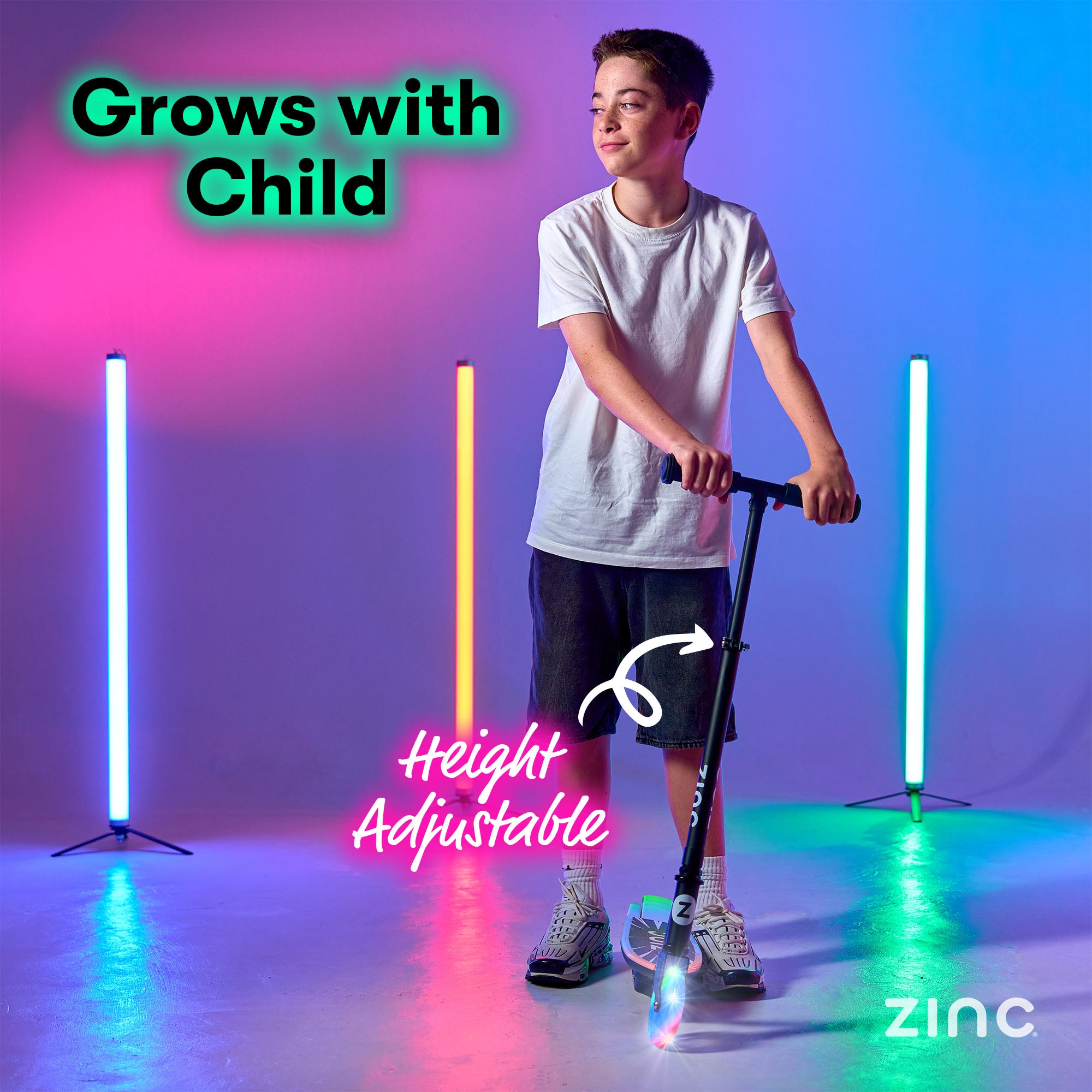 Electric scooter with LED illuminated deck providing visibility and style for young riders
