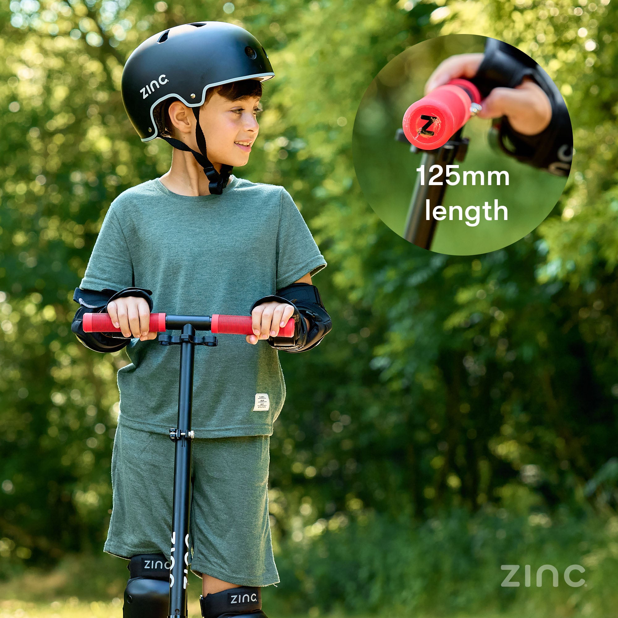 Cruise big wheel scooter in red with close up of the 125mm length