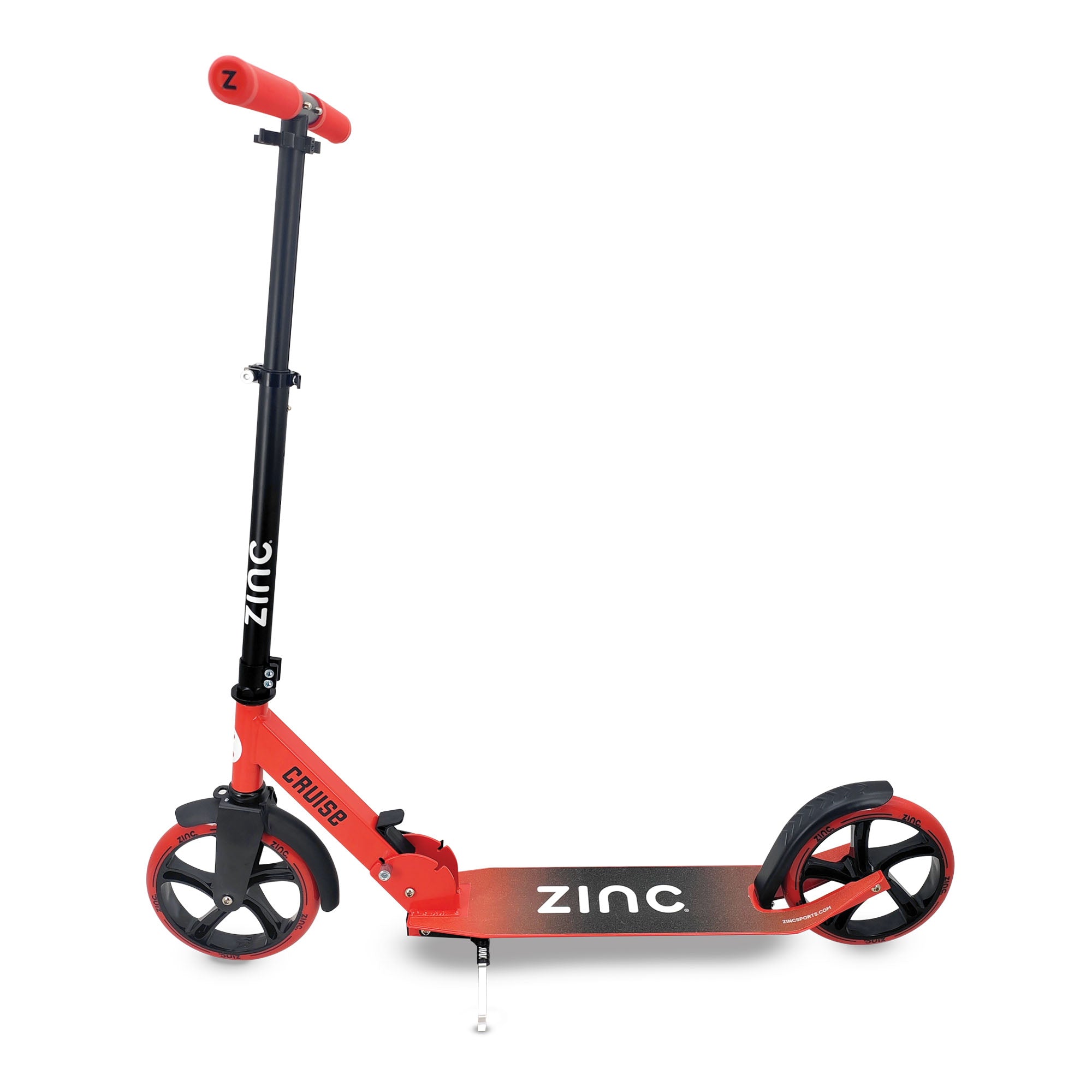 A red and black Zinc Cruise Big Wheeled Folding Scooter with two large wheels and a kickstand, designed for children.