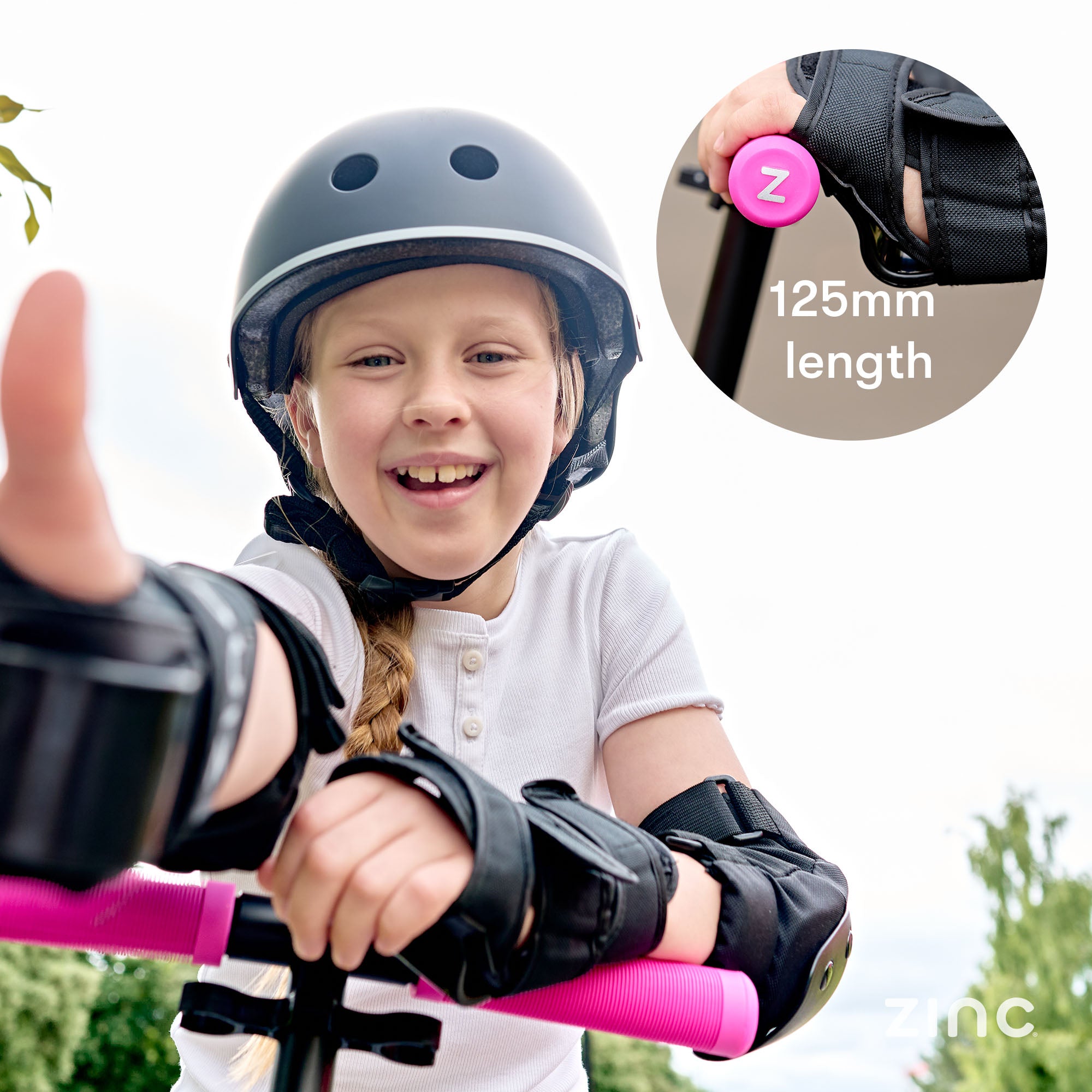 Young scooter rider wearing full protective gear