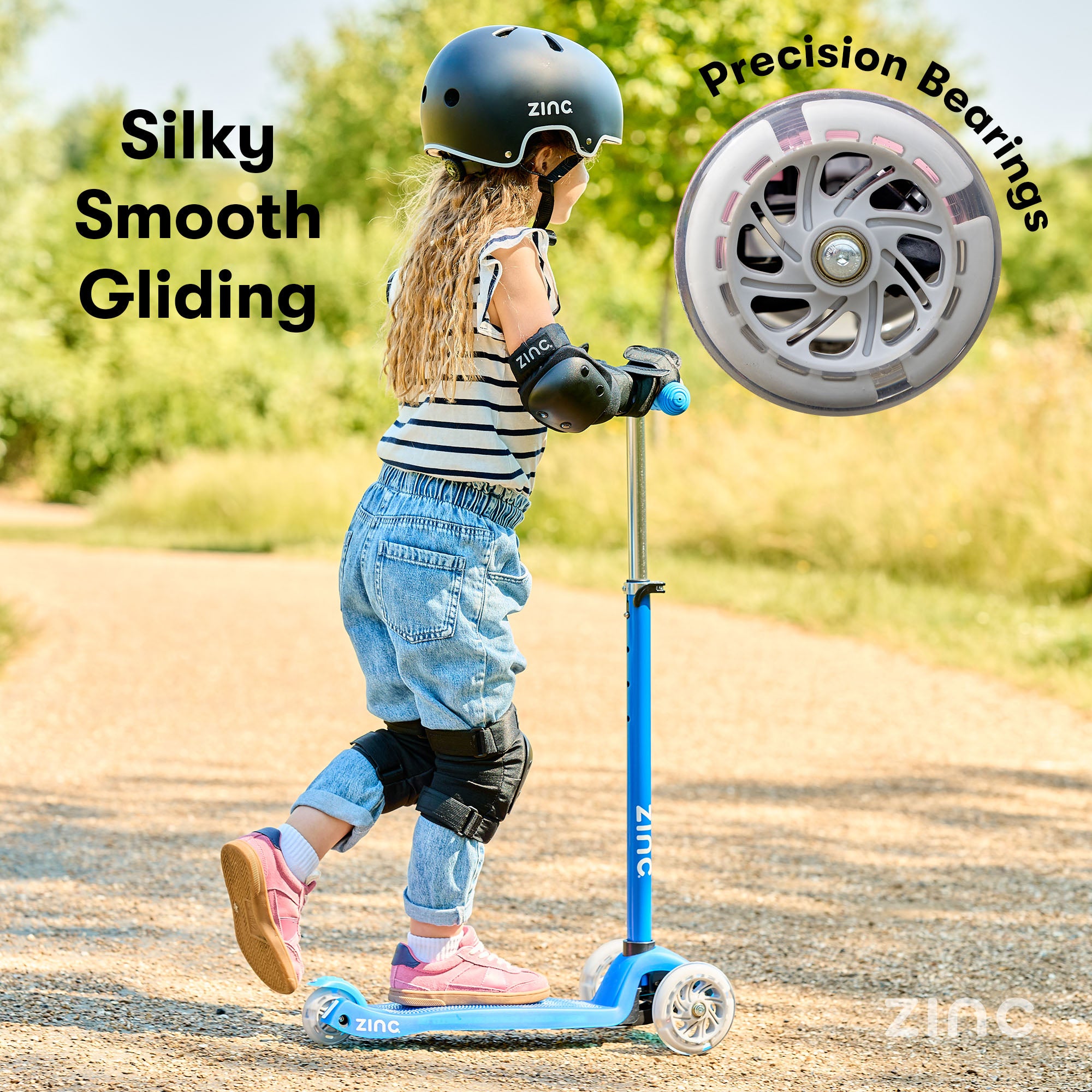 A blue three-wheeled Zinc Superstar non-folding scooter showing precision bearings for silky smooth gliding