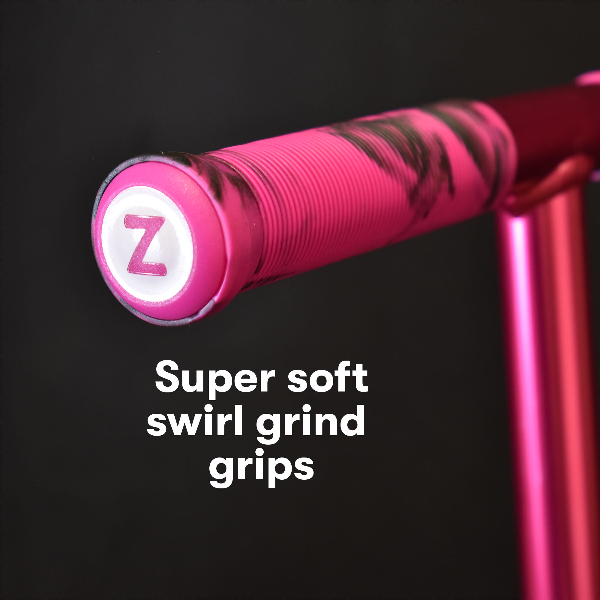 Soft grip handles on pink folding scooter providing comfortable hand positioning and reduced fatigue