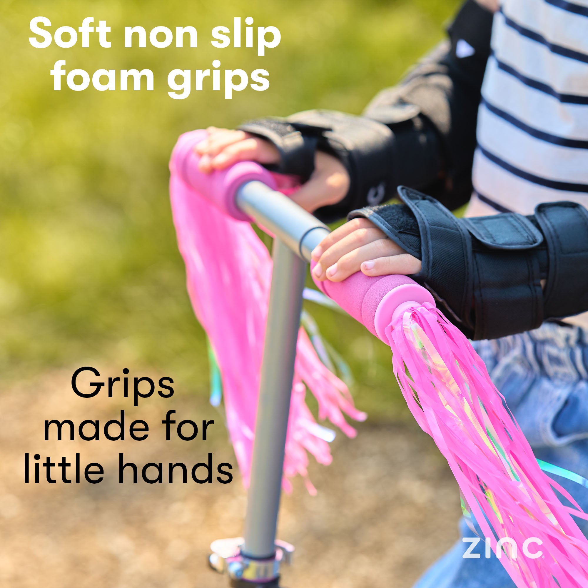 Soft touch foam grips on unicorn scooter with decorative tassels and adjustable height mechanism