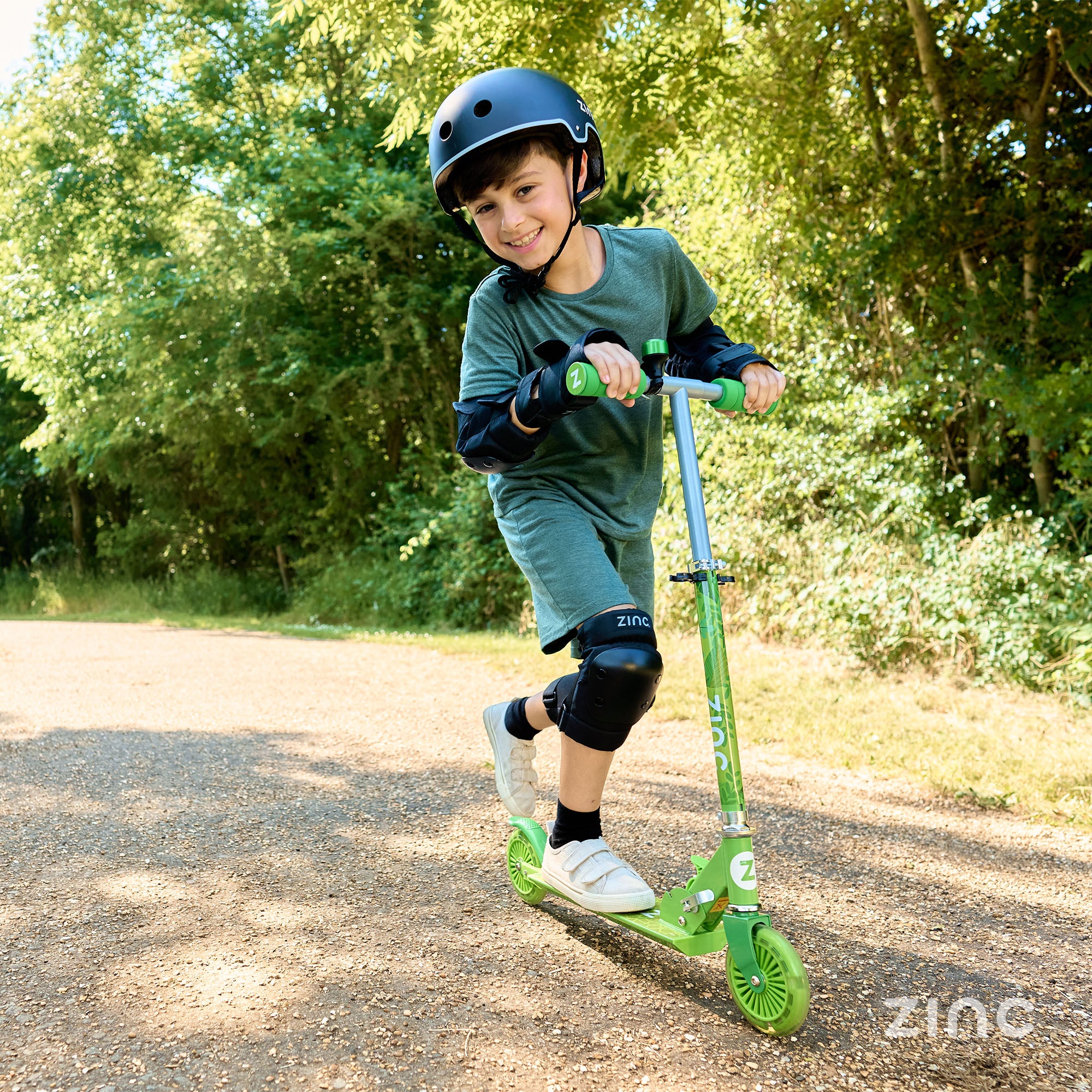 Dinosaur themed folding scooter featuring anti-slip footplate, rear footbrake, and adjustable height 70-80cm