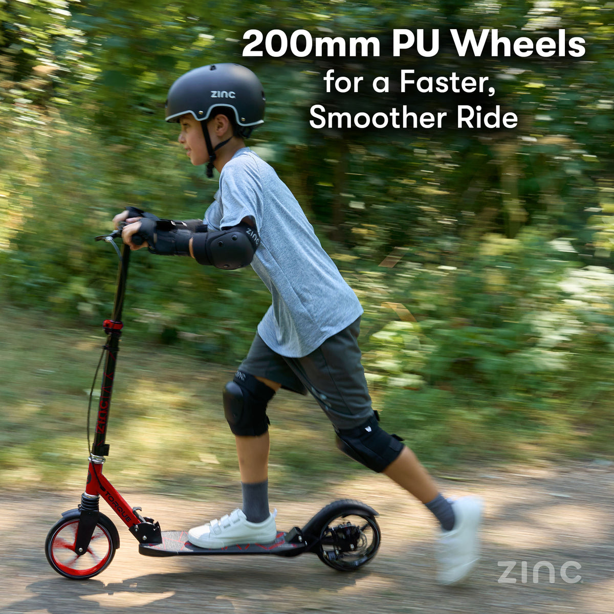 A child wearing a black helmet and protective gear rides a red and black electric scooter on a dirt path with blurred green trees in the background. White text at the top reads '200mm PU Wheels for a Faster, Smoother Ride' and the Zinc logo appears in the bottom right corner.