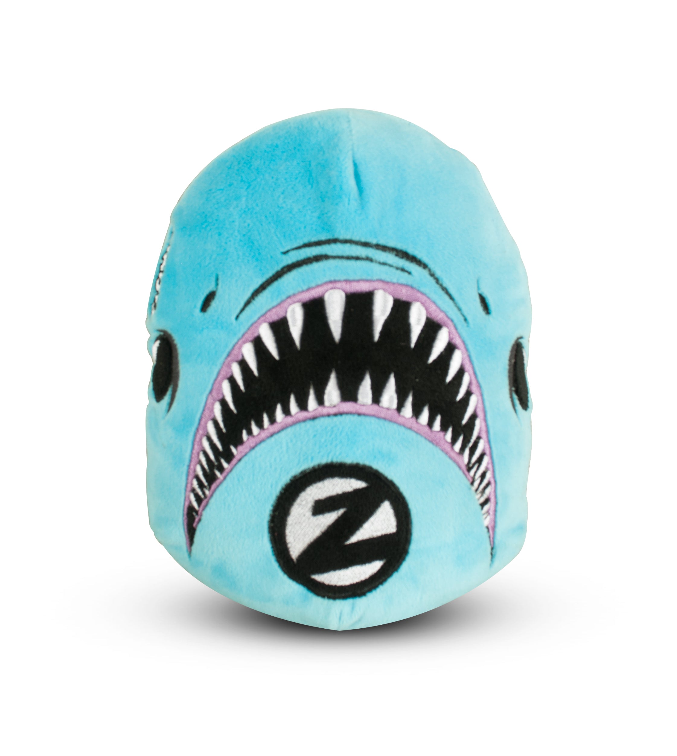 A plush toy shaped like a shark with a backpack feature and the letter 'Z' on it.