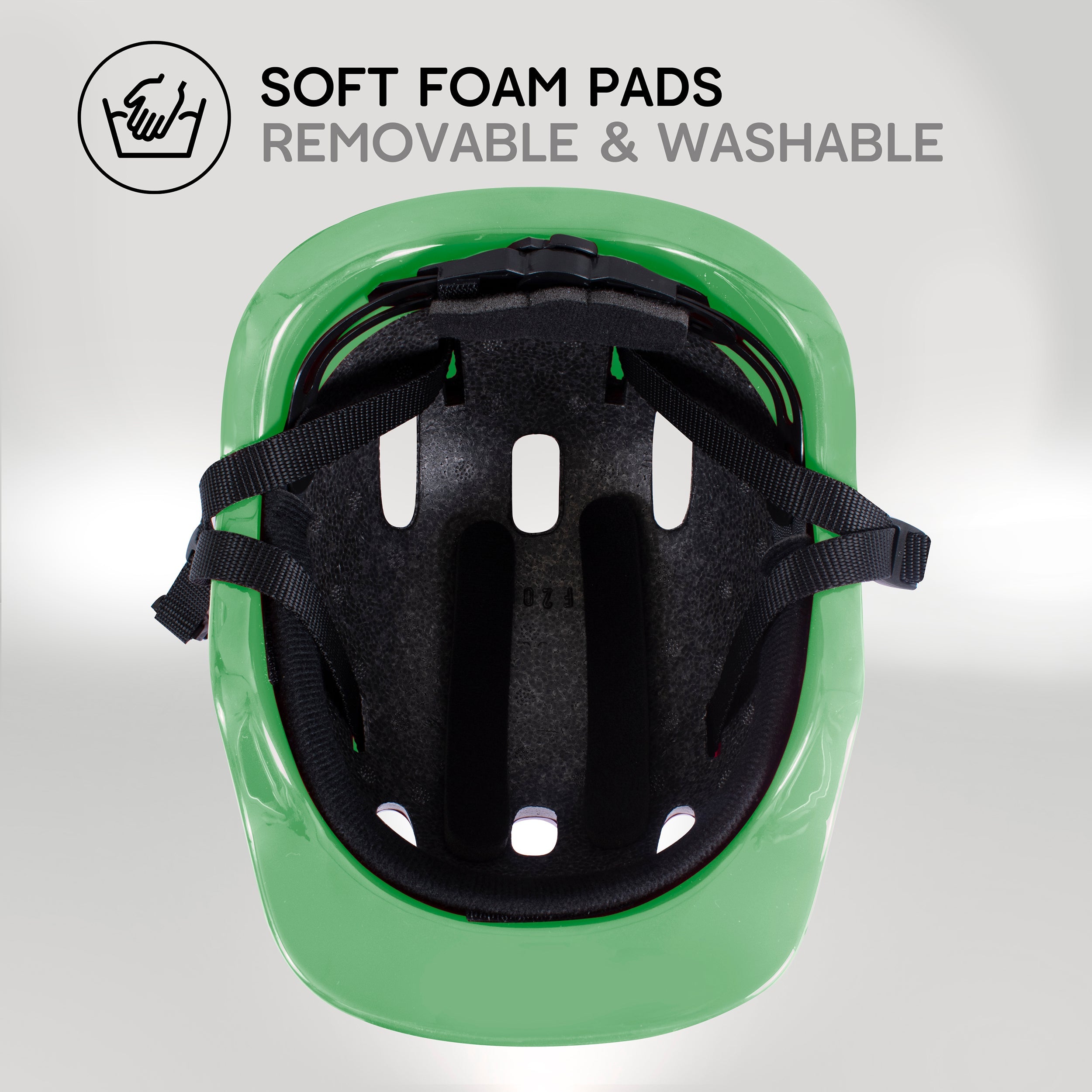 Zinc children's green bike helmet interior showing washable padding and comfort fit system