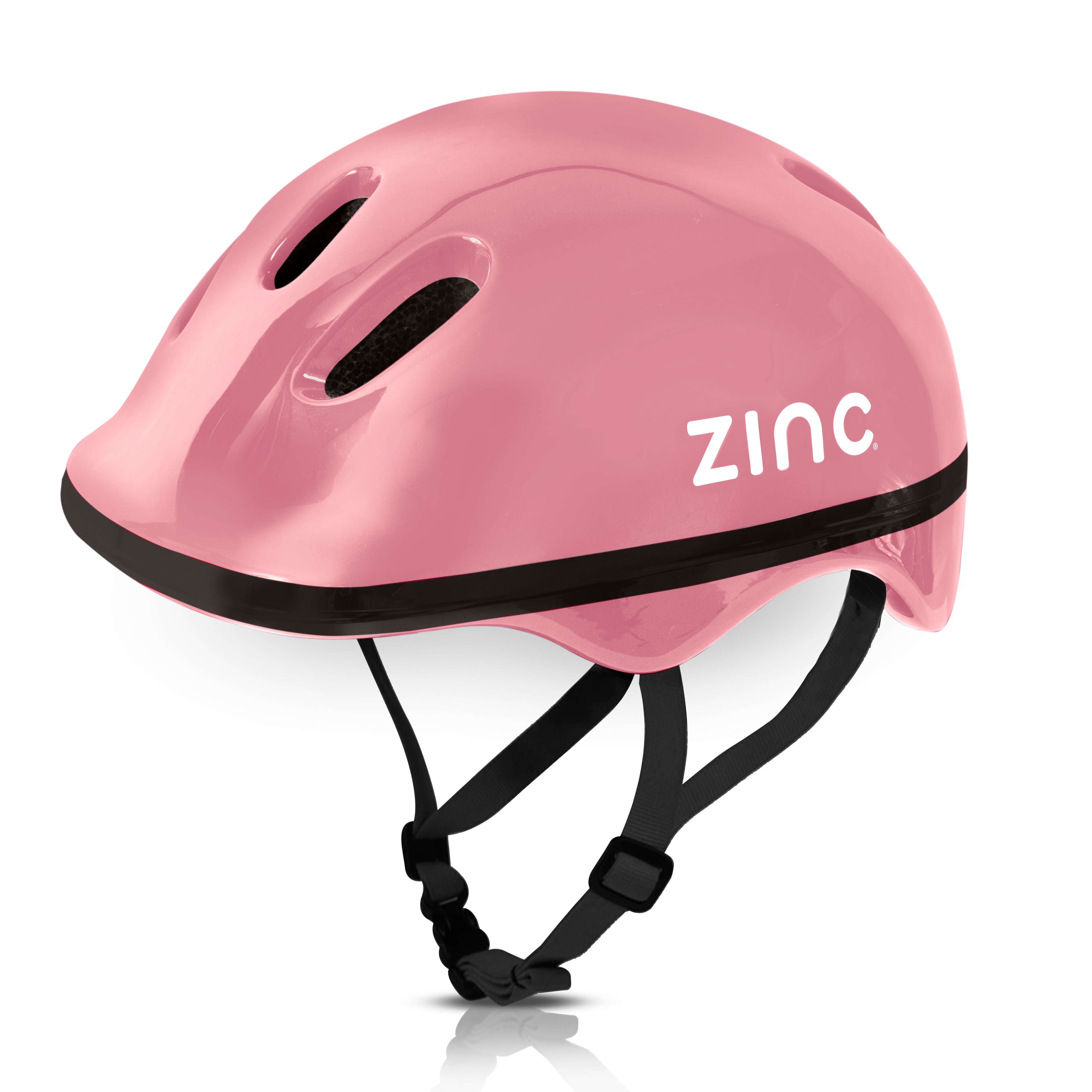 A pink children's bike helmet with the brand name 'ZINC' written on the side.
