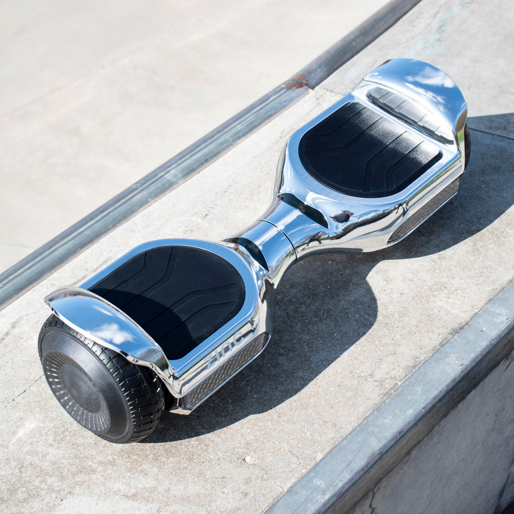 Self balancing hoverboard featuring 240W motor, 6.2mph speed, and premium chrome finish design