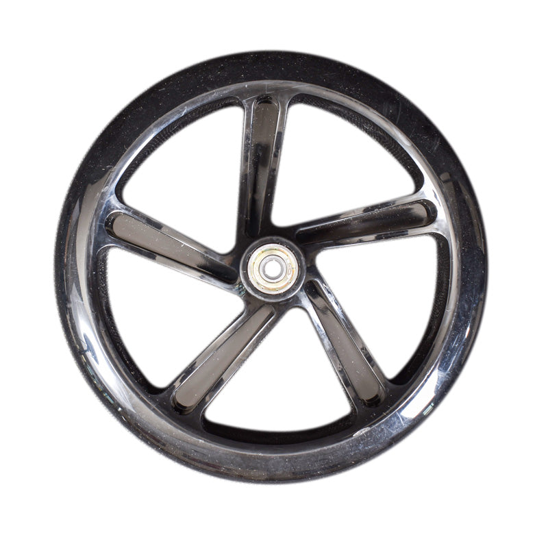 A single black, solid, circular scooter wheel with a visible center hub and five spoke-like features, isolated on a white background.